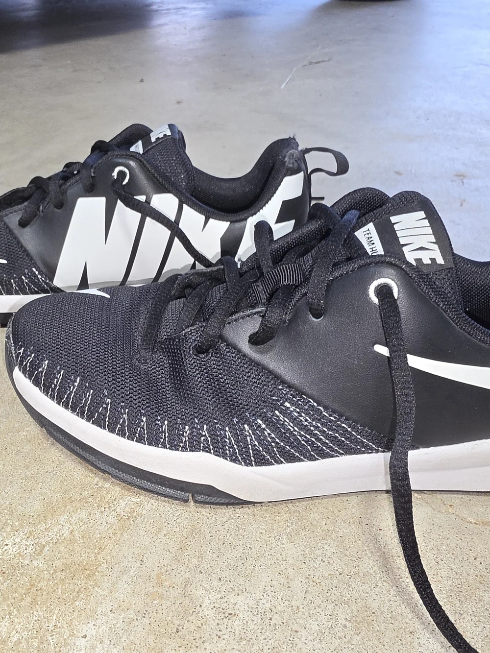 Nike Team Hustle D7 Black & White Youth Sneakers